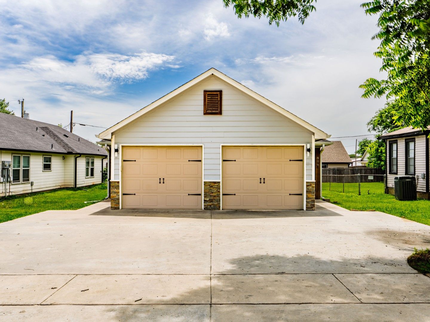 Exterior with garage and driveway